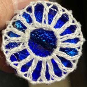 crochet covered glass bead pendant