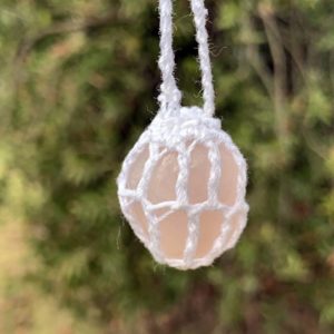 Polished rose quartz crystal pendant